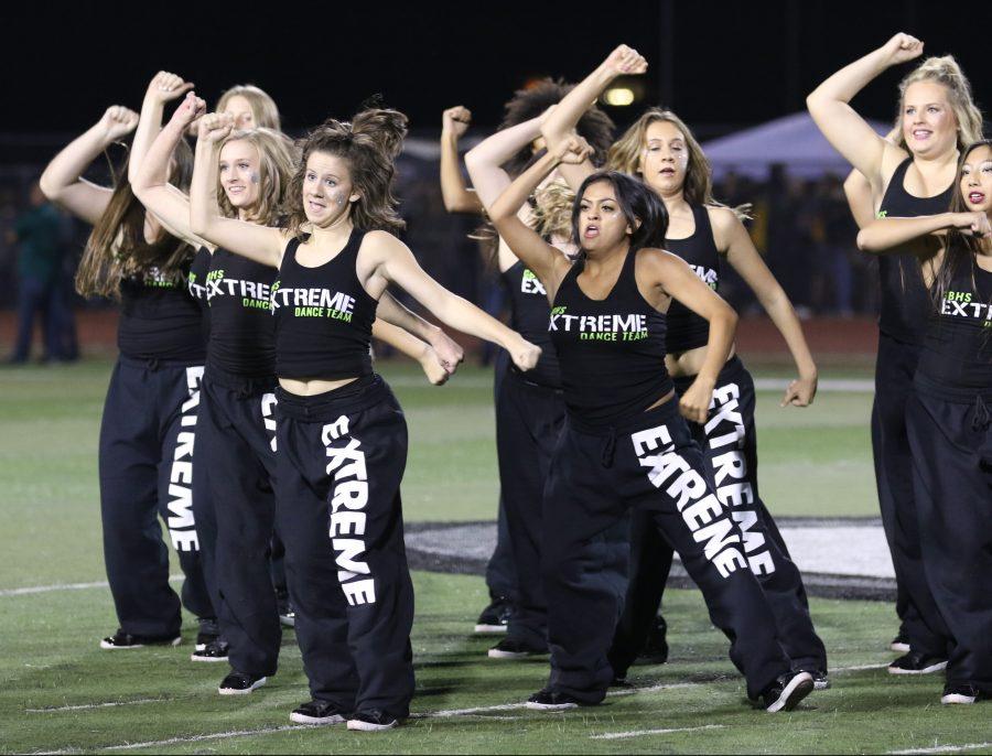 Making Many Memories at Homecoming: Junior Tessa Schafer dances to support the football team