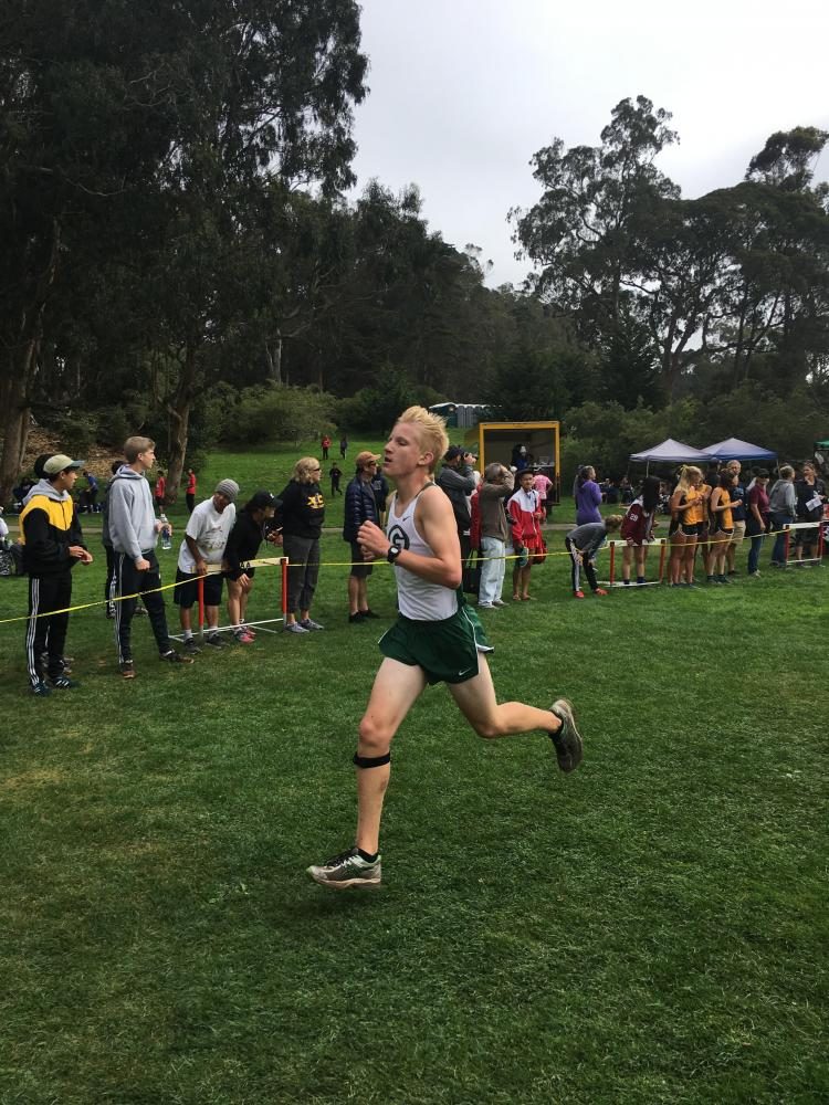 Granite Bay sophomore Jonathan Romeo sprints to the finish line, contributing to the second-place finish by the sophomore boys team.