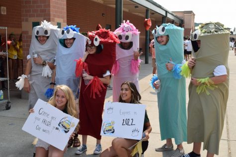 Link Crew is a huge part of Grizzly Retreat, freshmen orientation. Izzie Winger, bottom left, and Karissa Hodson, bottom right, pose with their freshmen dressed as inflatable tube men. 