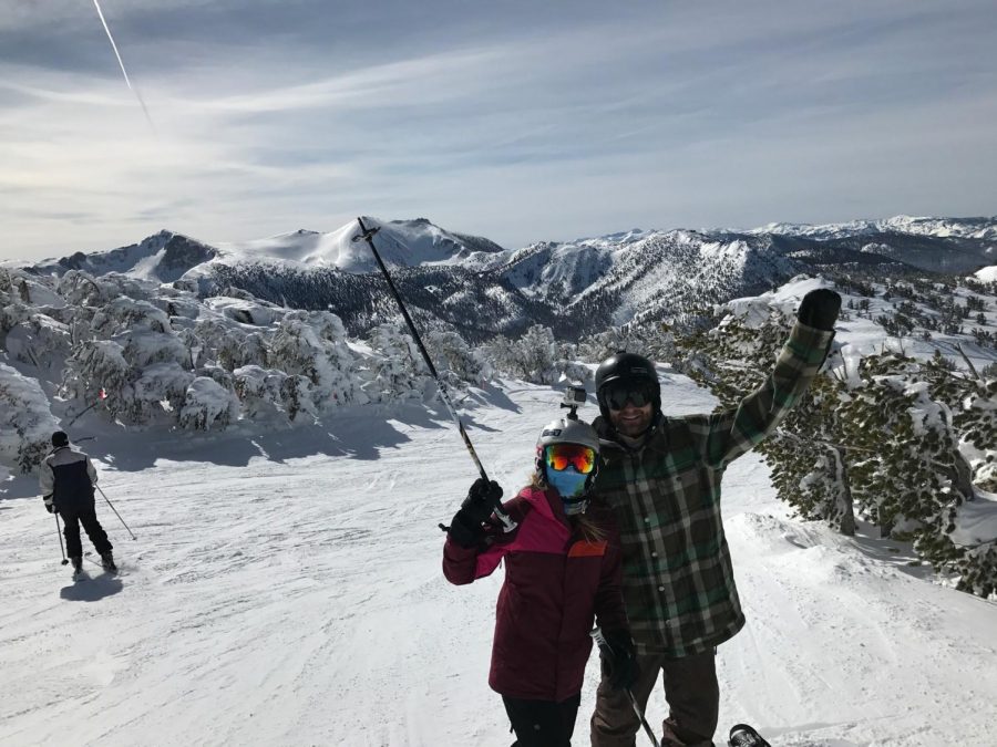 Senior Hannah Coons and her brother enjoy a day on the slopes.