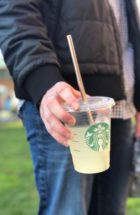 A GBHS student displays a metal straw which is a reusable alternative to environmentally damaging plastic. Many others are following the trend. 