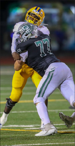 Joe Young tackles an opponent during a game against Grant High school.