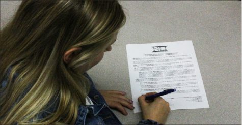 Signing a letter of intent is one part of the recruitment process for potential college athletes.