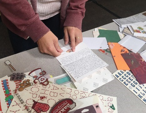 Penpal club member Paloma Garcia adds the last finishing touches to her letter for her special pal.