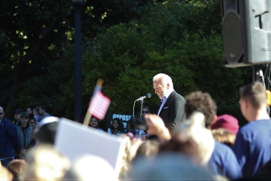 Pastor Greg Farrington addresses a crowd gathering outside the Capitol. 