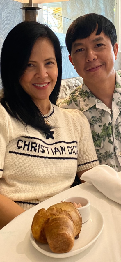 Happy couple eats at local restaurant.