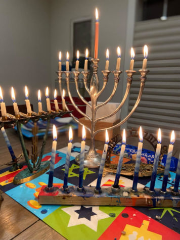 Fully-lit menorahs on the last day of Hanukkah.