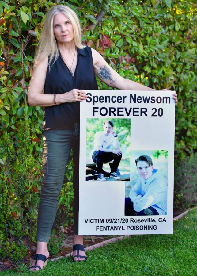 Laura Collanton poses with her son, Spencers photos for a fentanyl support groups P-A-I-N memorial project.