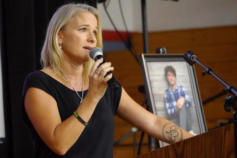 Laura Didier speaks at a fentanyl awareness assembly held at Pleasant Grove High School. 
Didier said the tattoo on her left arm is of Zachs name and age in an infinity symbol within a heart. The words encircling the symbols come from a letter Zach wrote at 14 to his future self, given to the Didiers after his death. 
Always remember our friends, family, dogs and potential we have in life.