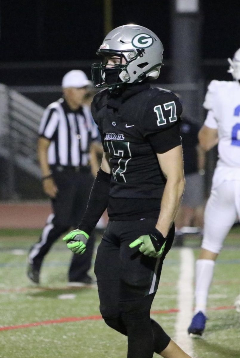 Carson Perry-Smith, a senior and captain for the Granite Bay Grizzlies Football Team serving as a cornerback (CB), gets ready to run a play against the Rocklin Thunder.
