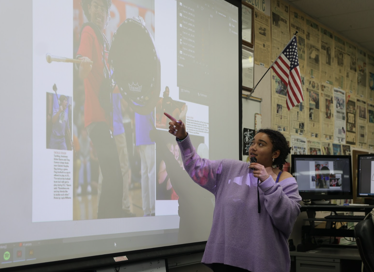 Yearbook Editor-in-Chief Layla Williams presents to the yearbook staff about the cutouts she used for the opening and closing pages of the yearbook. This is Williams second year as Editor-in-Chief. 