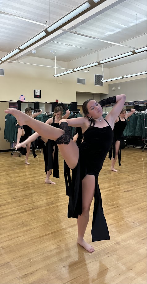Audrey Benner, a member of the dance team and TI, is seen rehearsing. 