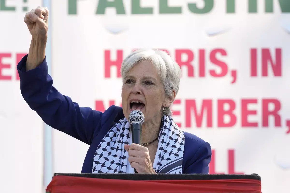 Jill Stein protests Harris during a rally in Chicago this August
(Alex Brandon / Associated Press)