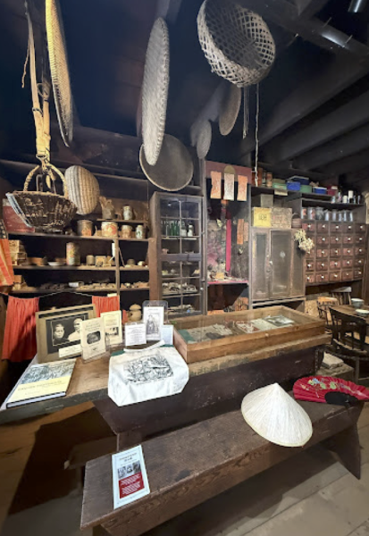 A more upkeep are by the mu- seum, but still has that dusty and old paper like ascent in the air. This particular room
is seen after you walk through the main entrance. The bottles and misc. Items on the shelves are items that are sold by the apothecary.