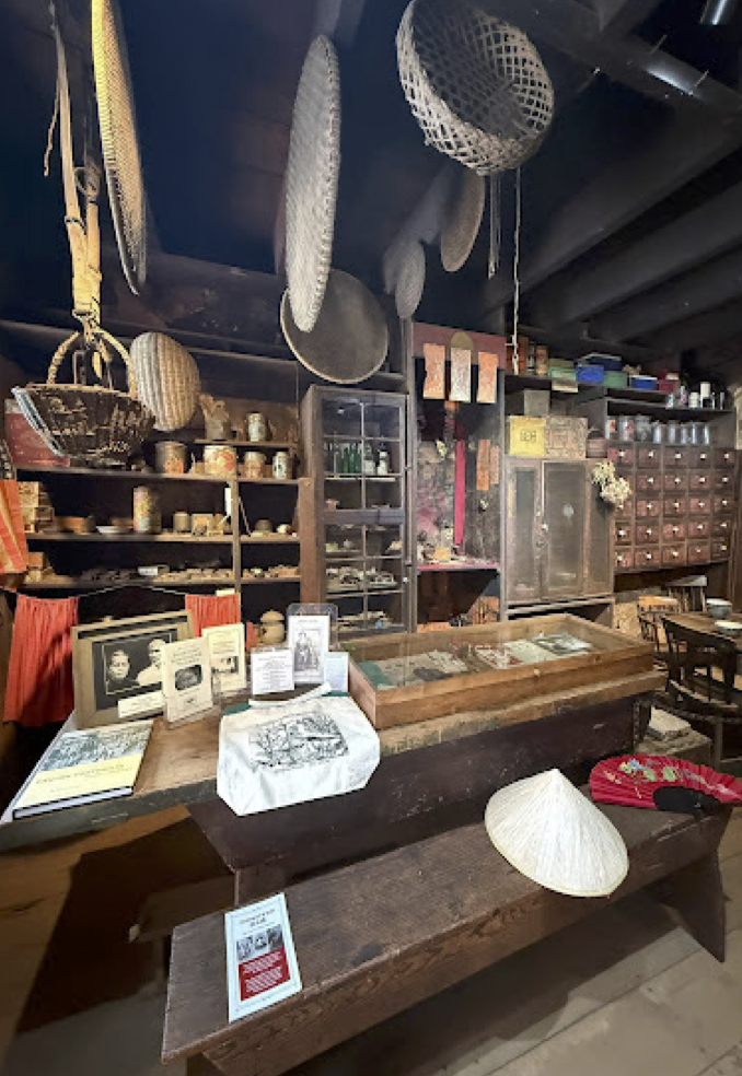 A more upkeep are by the mu- seum, but still has that dusty and old paper like ascent in the air. This particular room
is seen after you walk through the main entrance. The bottles and misc. Items on the shelves are items that are sold by the apothecary.
