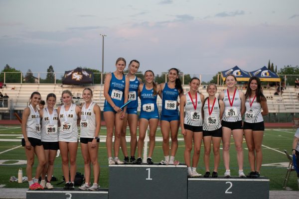 JV girls 4x400m relay team wins second place.