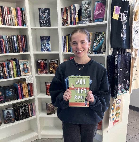 Wheeler poses with her book, now available for purchase in Barnes and Noble, Amazon and local bookstores. 