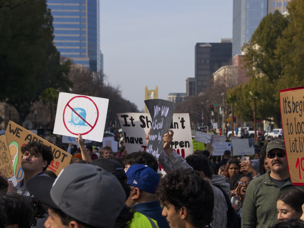 Sacramento-area high school students gather at the California Capitol square, marching to protest Immigrations and Customs Enforcement. 